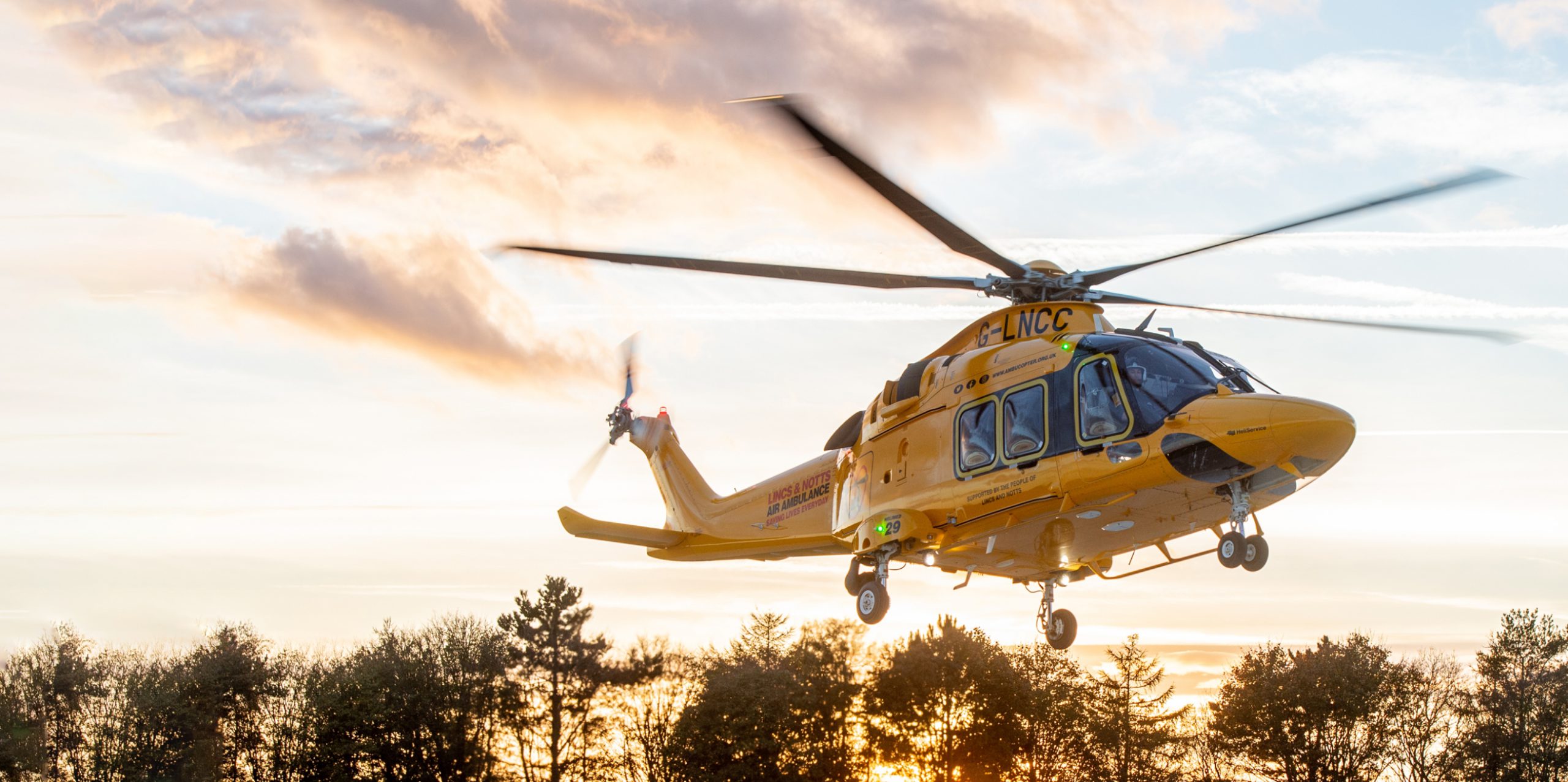 LNAA helicopter taking off at sunset