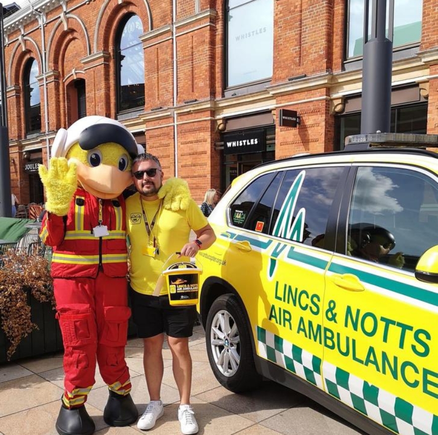 Our charity team with our mascot paramedic duck