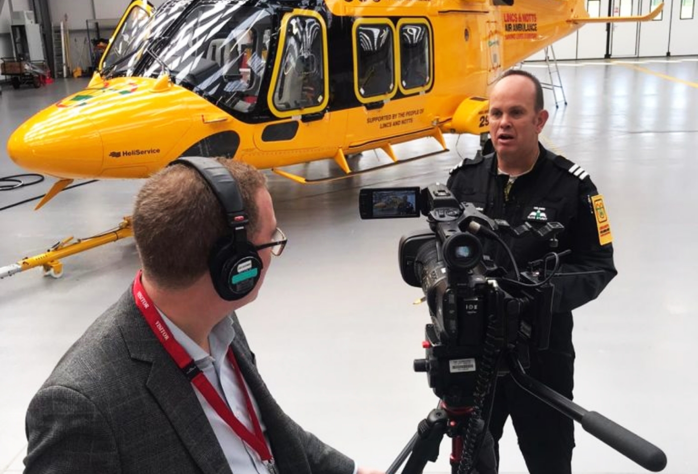 LNAA pilot speaking to camera crew