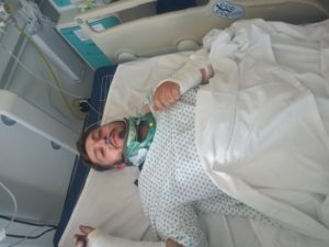 Man in bed on life support