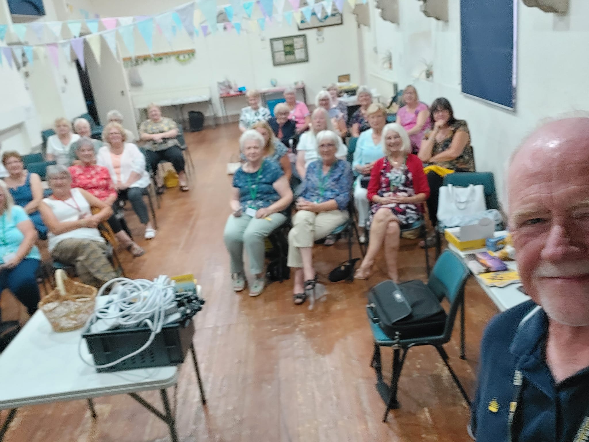 Volunteer giving talk to WI group