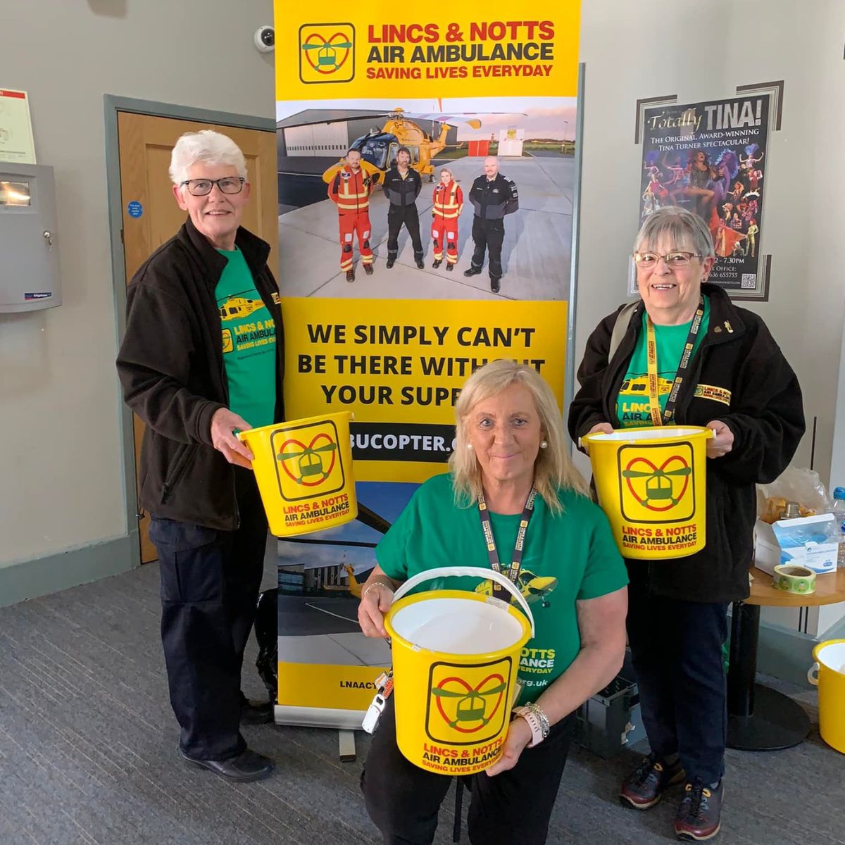 Fundraising volunteers collecting at an event