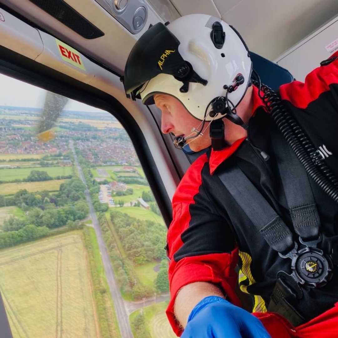 Paramedic in helicopter on way to scene