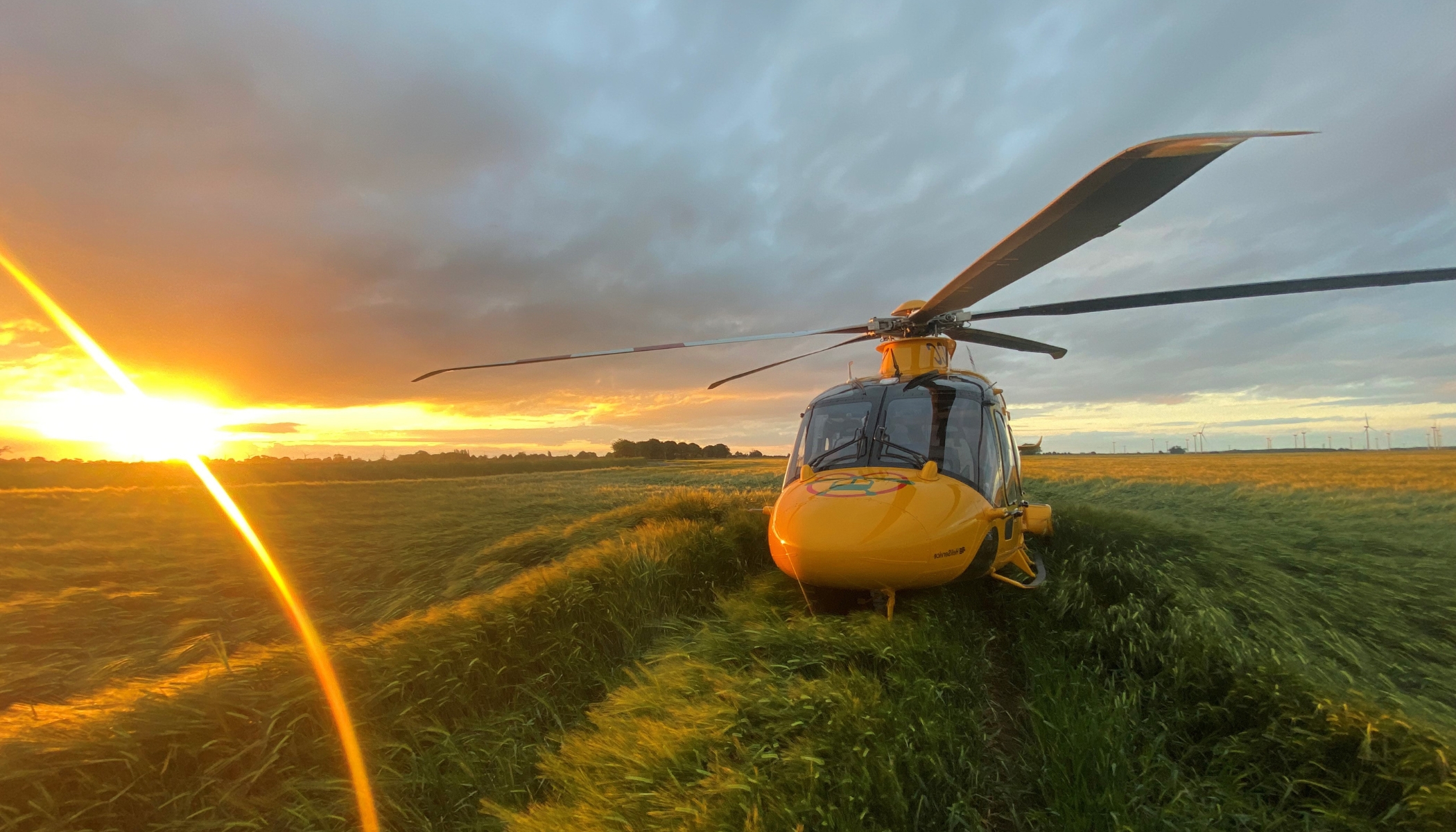 Helicopter landed in grass