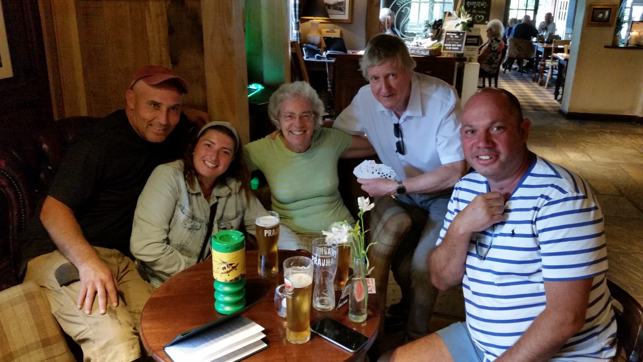 people playing cards in pub for LNAA