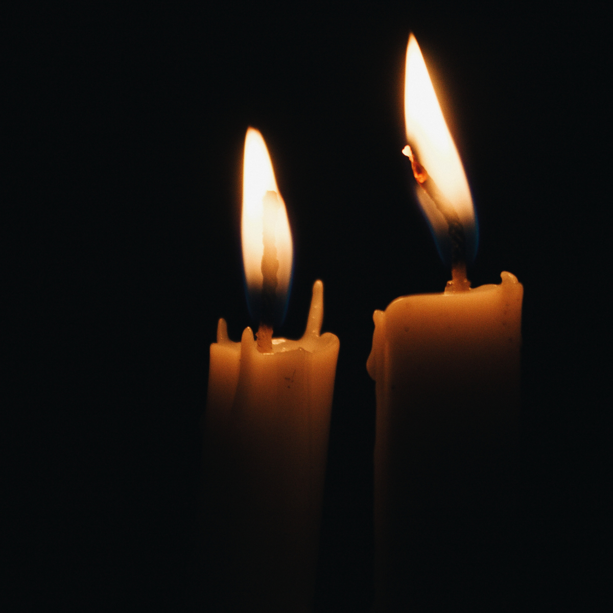 Candles on black background