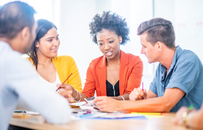 Group of people sitting around a table