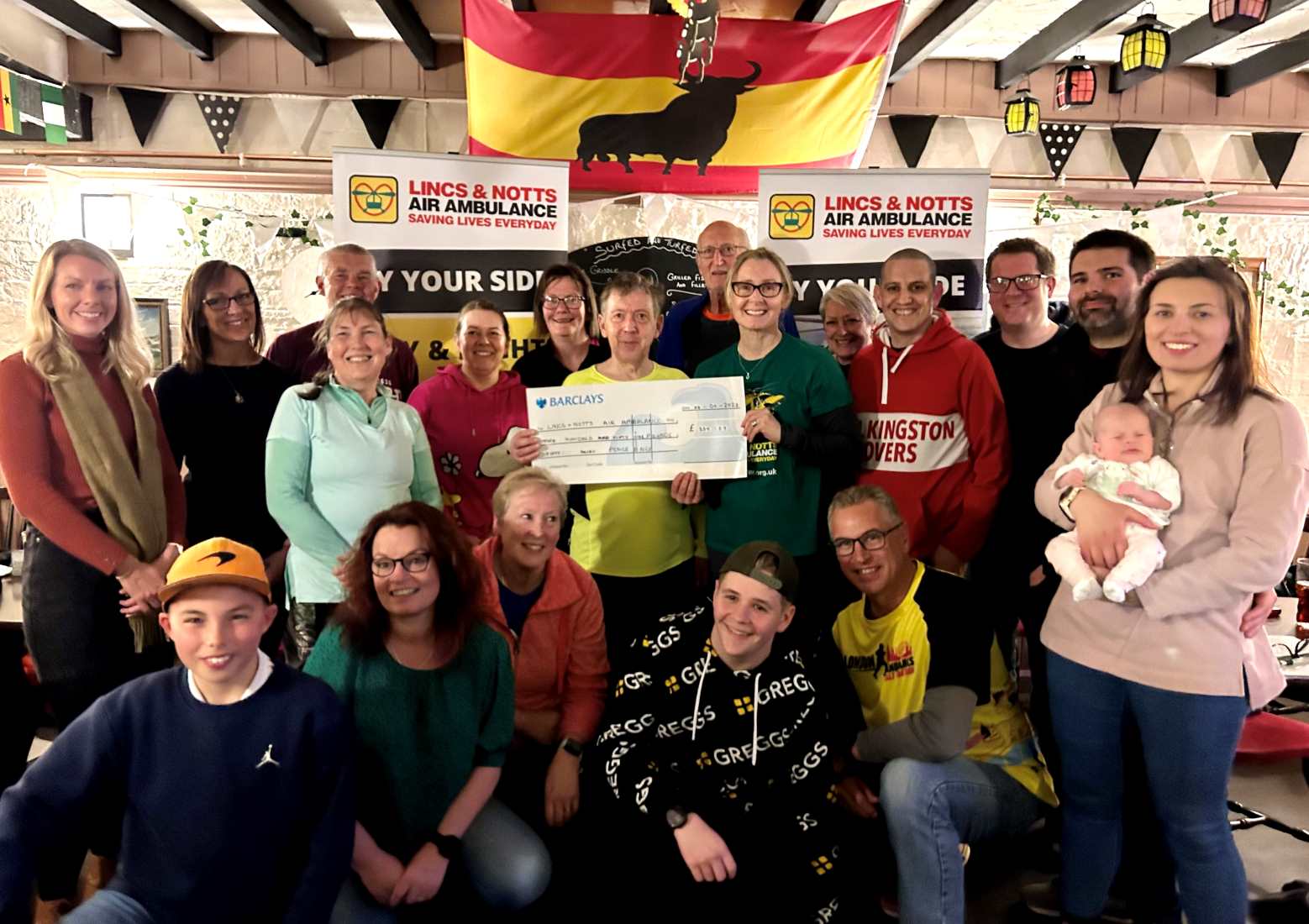 Horncastle Running Club give cheque to LNAA