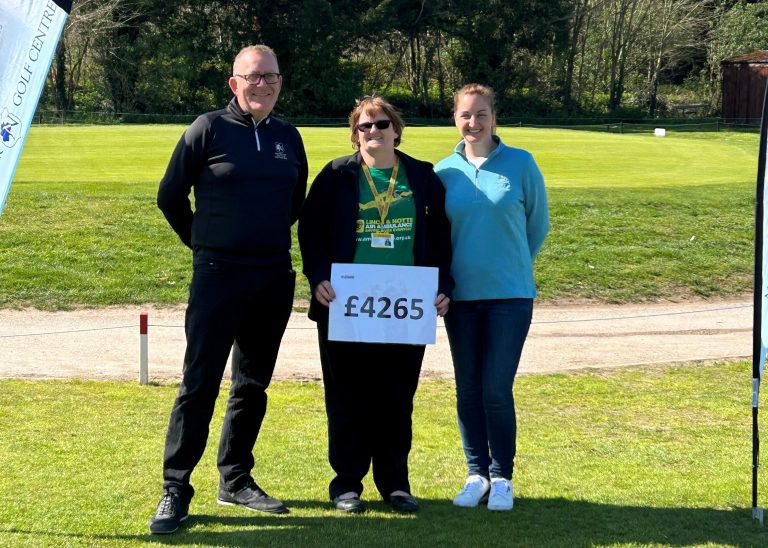 Norwood Park Golf Club present cheque to Lincs & Notts Air Ambulance