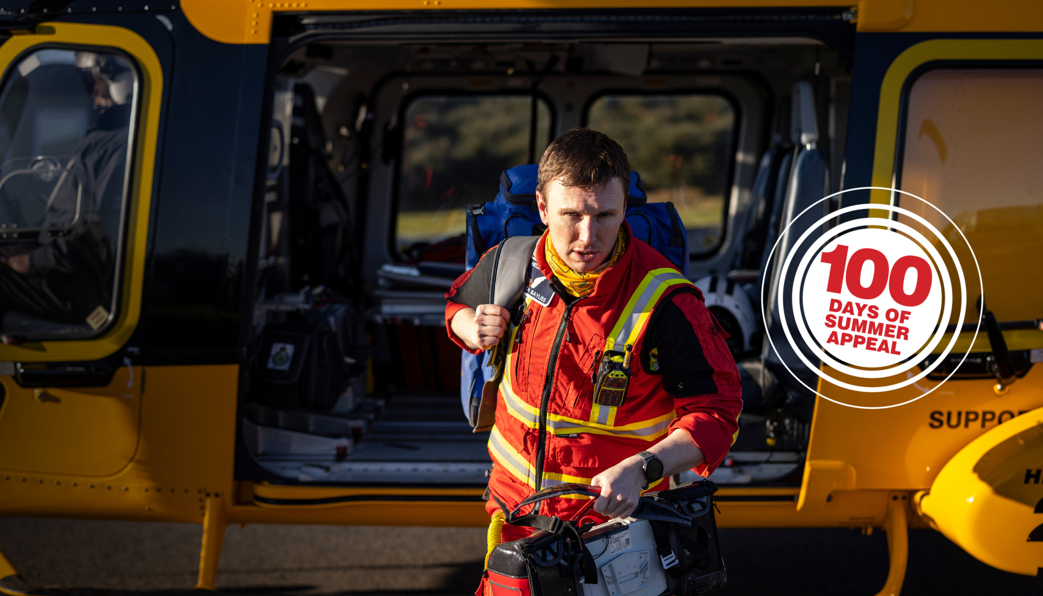 Doctor walking out of helicopter and 100 days of summer appeal logo