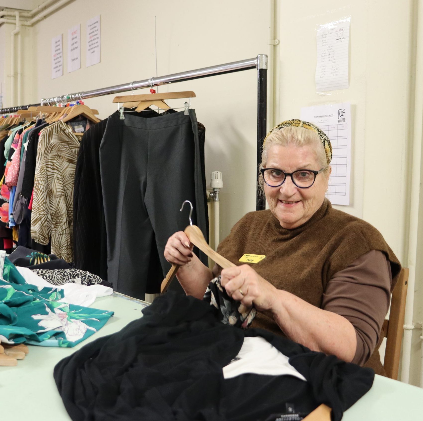 Volunteer working in charity shop