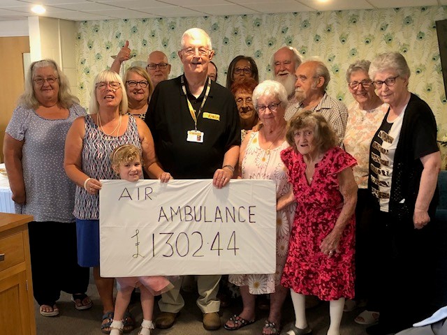 Residents of Miller Court Wainfleet give cheque to LNAA