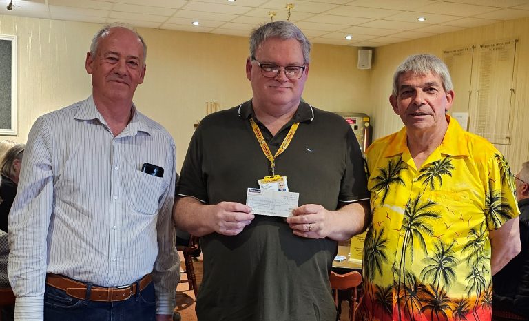 men from social club with chq for LNAA