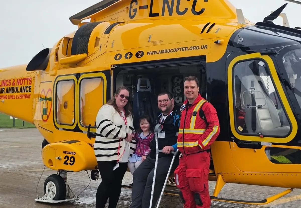 Tony Morflitt and LNAA crew at helicopter
