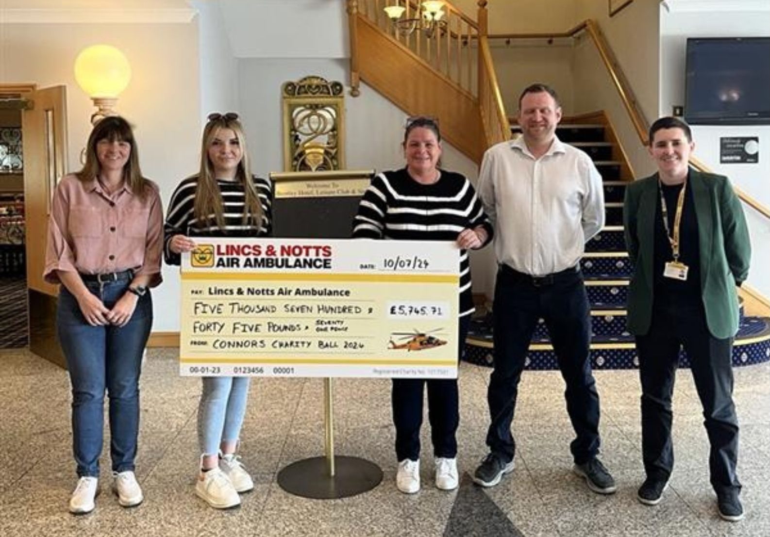 Michelle Peters presents cheque to LNAA