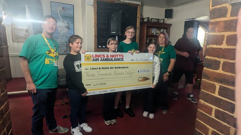 winkfest cheque presentation to LNAA