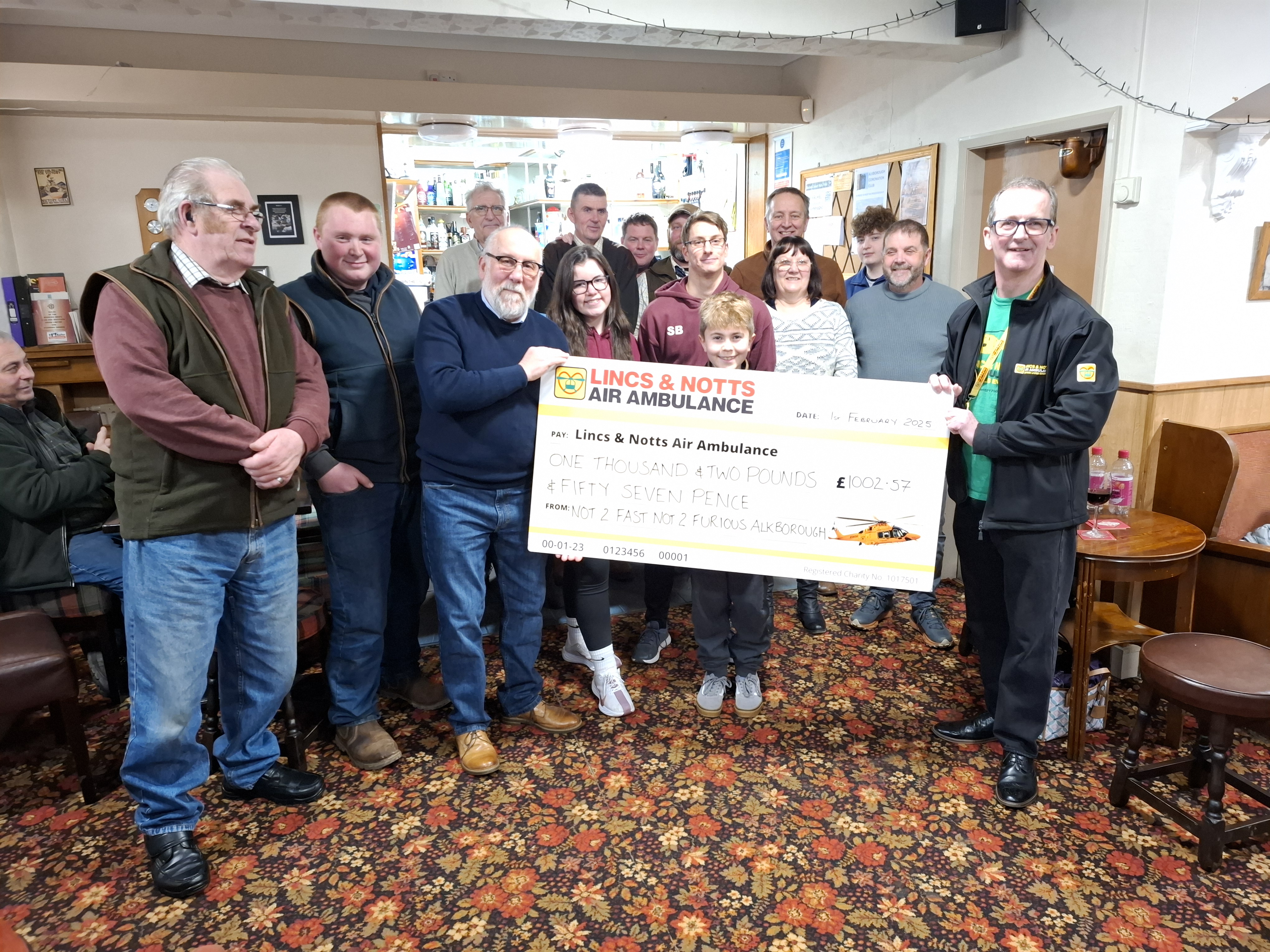 Alkborough community give cheque to LNAA