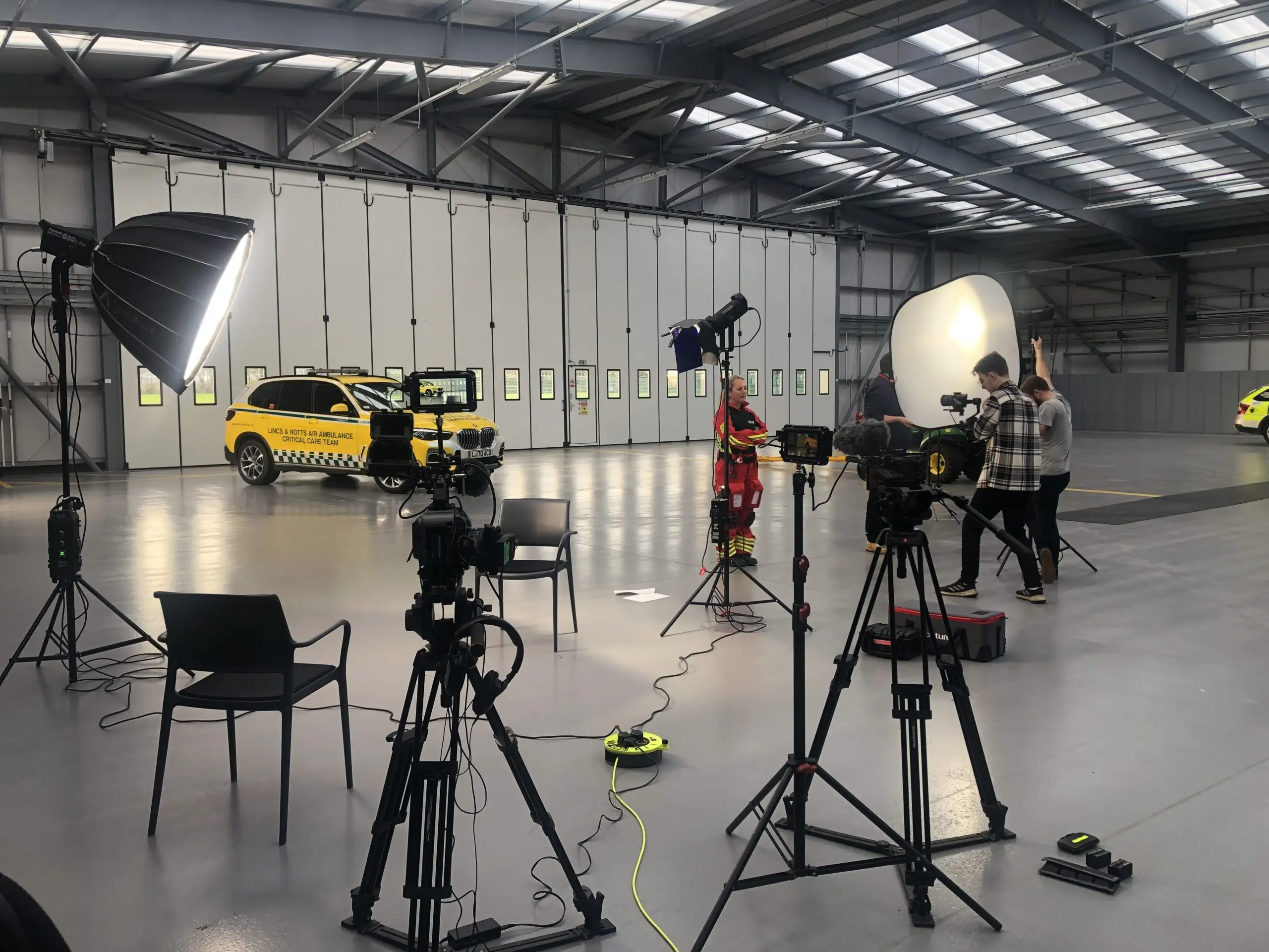 Film crew in LNAA hanger